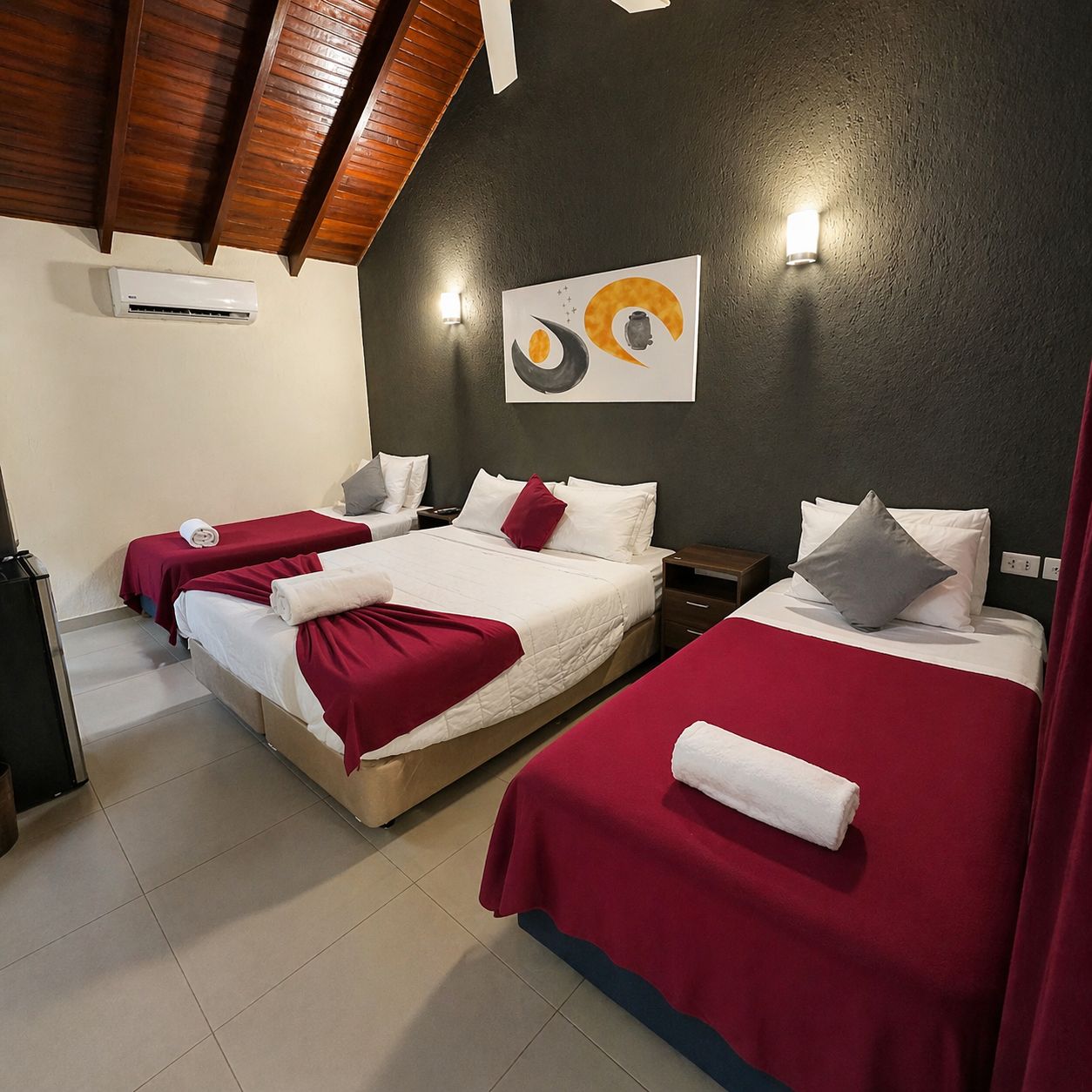 Habitación Cuádruple — El Nogal Casa Hotel
